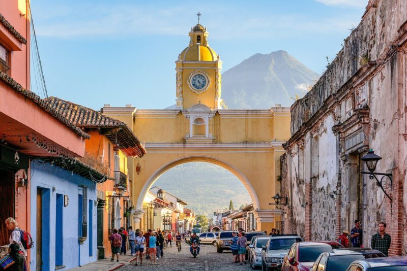 The Santa Catalina Arch in Antigua Guatemala with Agua volcano behind it